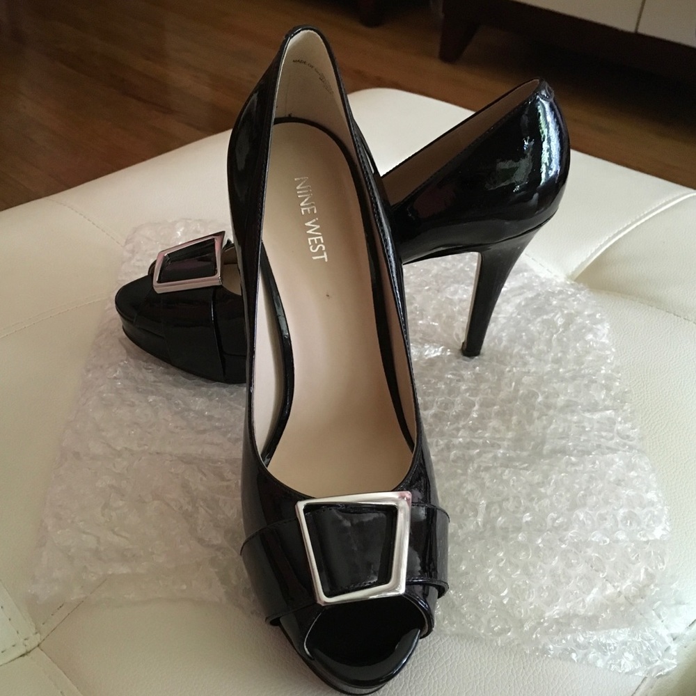High heel, peep toe pumps. NINE WEST